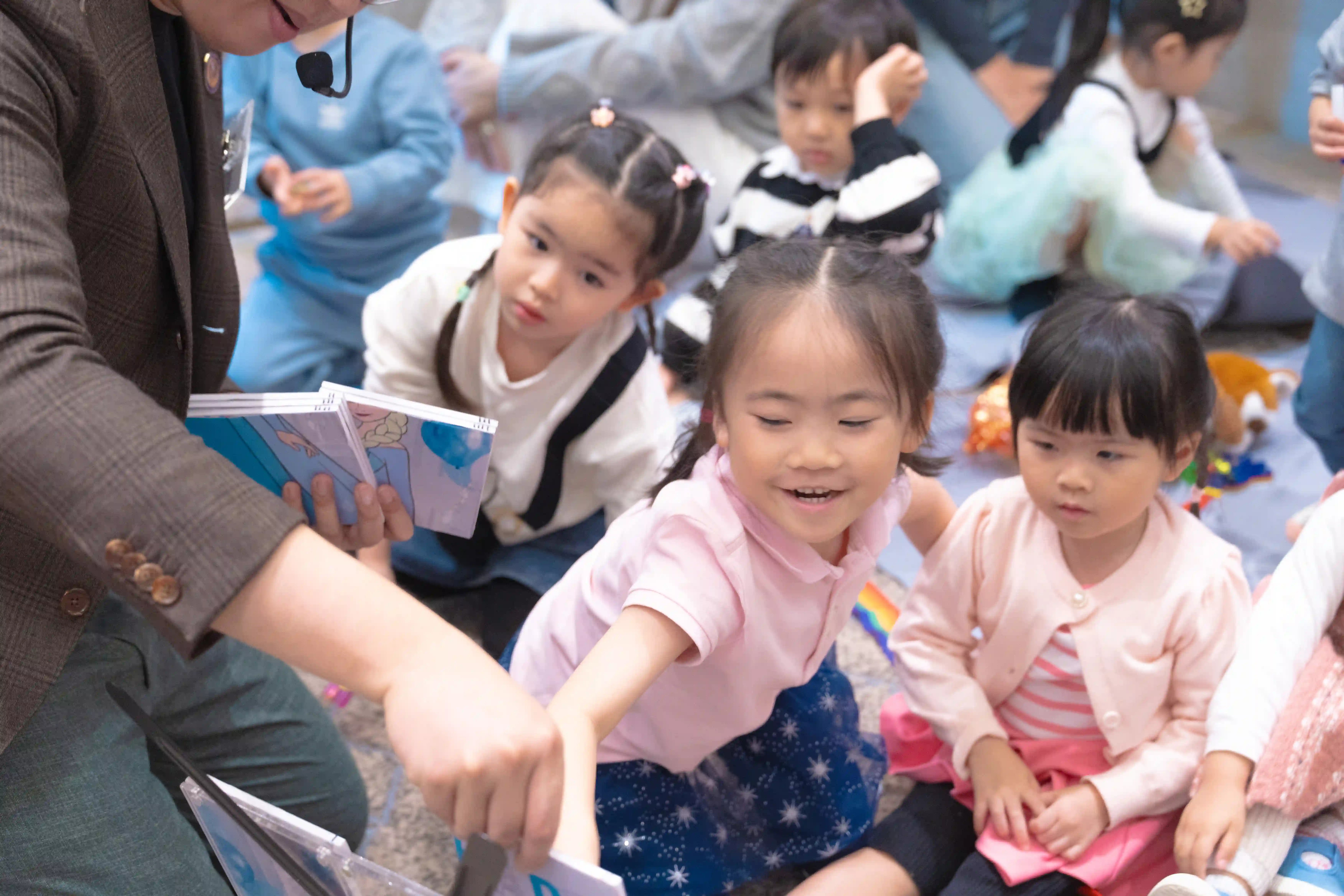 Gentle magician interacting with a young child, showing a friendly approach